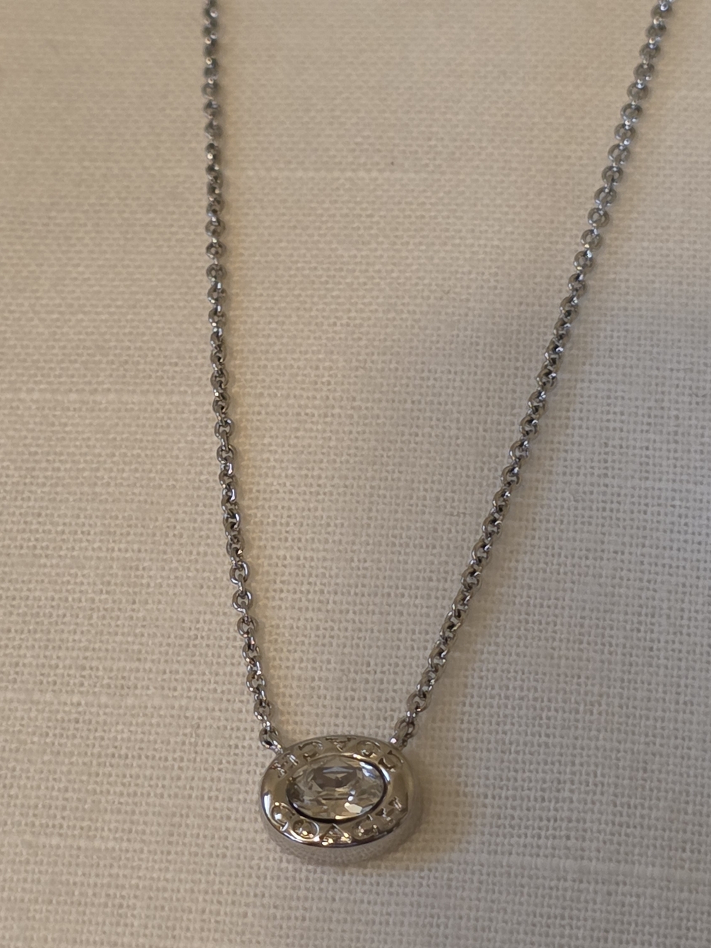 Coach Silver-Tone Crystal Pendant Necklace